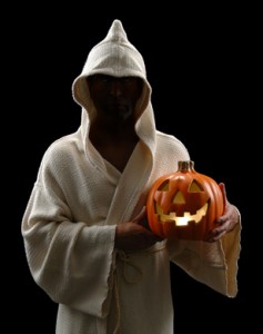 Hooded Man With Jack-o-Lantern