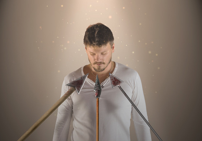 Man Surrounded by Enemies with Spears